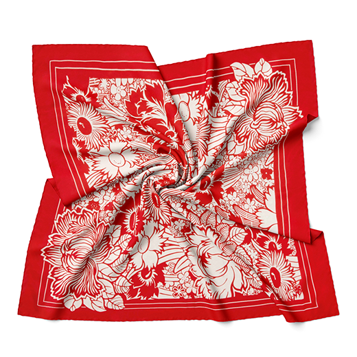 A square silk scarf with a red floral pattern.